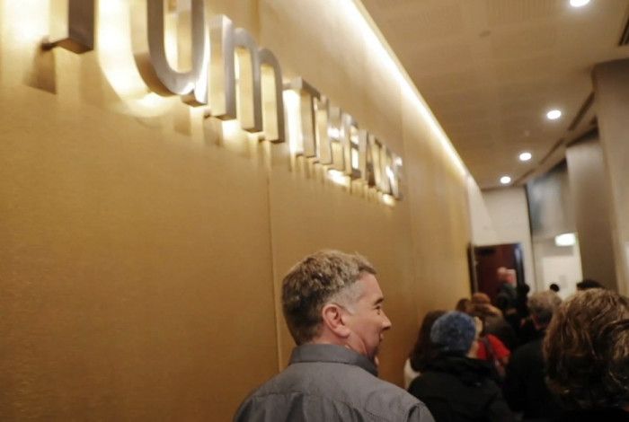 audience walking into theatre