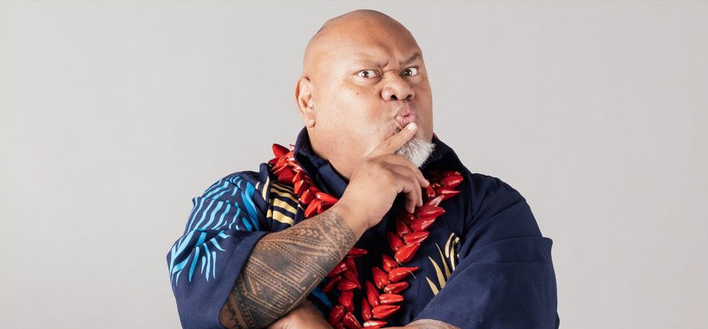 Tofiga Fepulea'i whith his hand to his mouth in a shushing gesture