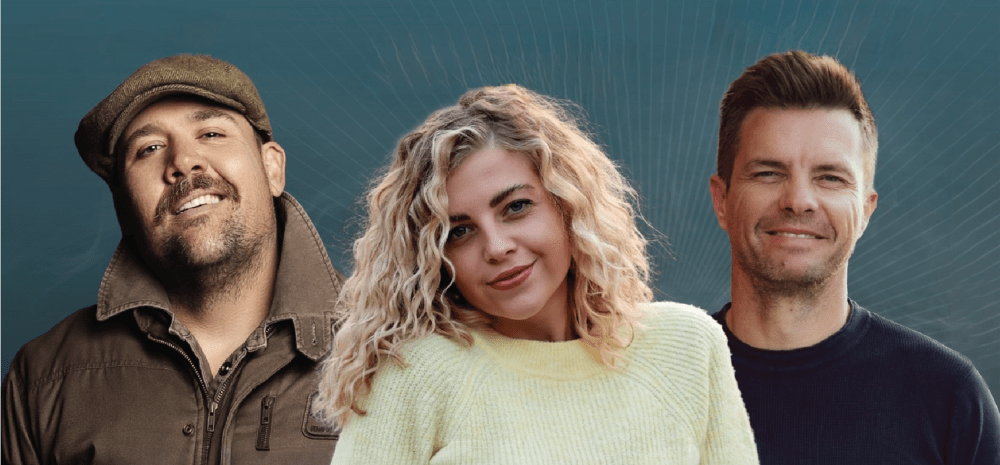 Three people looking at the camera smiling.