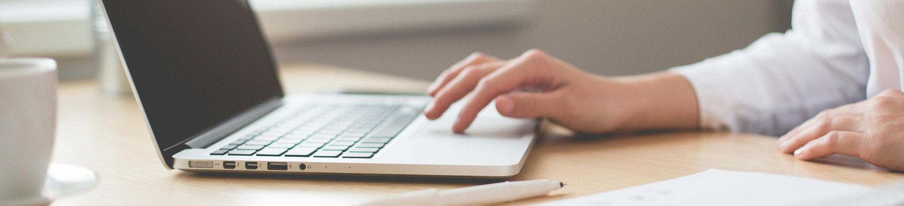 Someone using a laptop