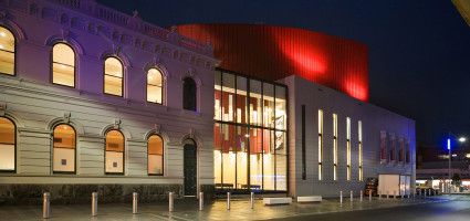 Drum Theatre building at night